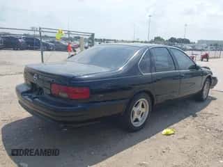 1995 Chevrolet Caprice z VIN 1G1BL52PXSR146162, wystawiony jako IAAI lot #43228456 z przebiegiem 78 324 mil mil oraz . Historia ofert i sprzedaży dostępna na DreamBid. Obrazek 4.