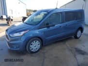 ✅ 2022 Ford Transit Connect XLT • VIN: NM0GS9F21N1509938 • Lot: 79404264. Listed on Copart with 103,223 mi. Free auction sales archive from the USA and detailed vehicle history report at DreamBid. Image 1.
