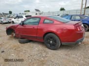 ✅ 2012 Ford Mustang Premium • VIN: 1ZVBP8AM5C5281902 • Lot: 59710855. Listed on Copart with 69,696 mi. Free auction sales archive from the USA and detailed vehicle history report at DreamBid. Image 2.