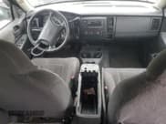 ✅ 2004 Dodge Dakota SLT • VIN: 1D7HG48N54S721985 • Lot: 81487634. Wystawiony na Copart z przebiegiem 228 354 mil. Bezpłatny archiwum sprzedaży aukcyjnych z USA i szczegółowy raport historii pojazdu na DreamBid. Zdjęcie 8.