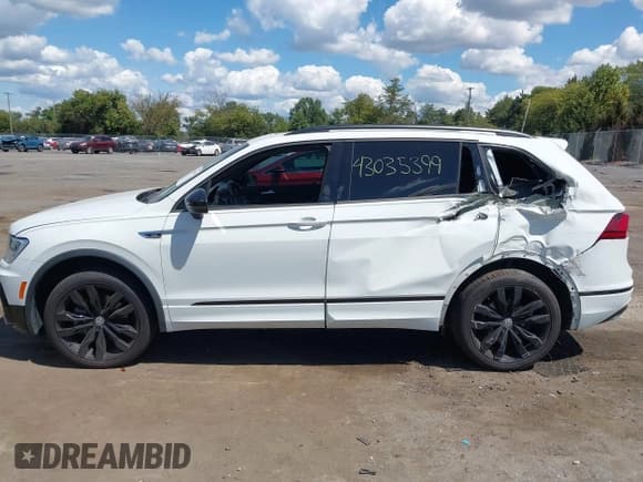 ✅ 2021 Volkswagen Tiguan SE • VIN: 3VV2B7AX5MM054356 • Lot: 43035399. Wystawiony na IAAI z przebiegiem 87 671 mil. Bezpłatny archiwum sprzedaży aukcyjnych z USA i szczegółowy raport historii pojazdu na DreamBid. Zdjęcie 14.