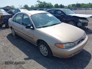 ✅ 1999 Ford Escort LX • VIN: 1FAFP10P7XW198467 • Lot: 42278961. Listed on IAAI with 293,835 mi. Free auction sales archive from the USA and detailed vehicle history report at DreamBid. Image 1.