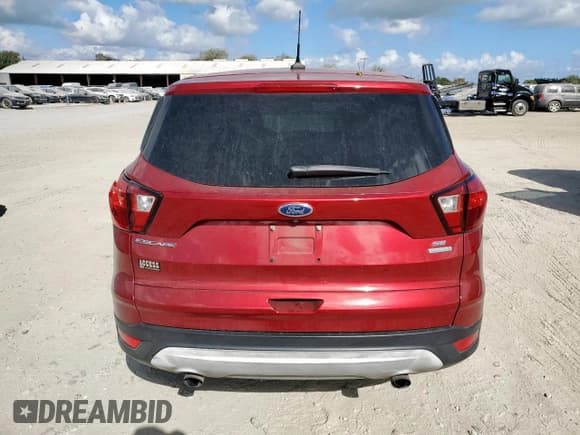 ✅ 2019 Ford Escape SE • VIN: 1FMCU0GD2KUB57160 • Lot: 85437015. Wystawiony na Copart z przebiegiem 108 729 mil. Bezpłatny archiwum sprzedaży aukcyjnych z USA i szczegółowy raport historii pojazdu na DreamBid. Zdjęcie 6.