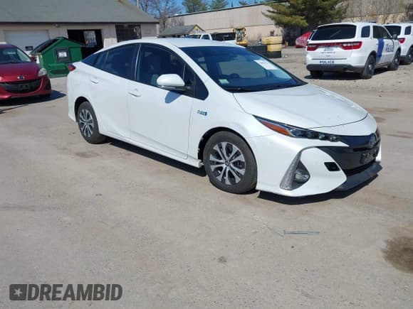 ✅ 2021 Toyota Prius LE • VIN: JTDKAMFP8M3174629 • Lot: 42087974. Listed on IAAI with 16,348 mi. Free auction sales archive from the USA and detailed vehicle history report at DreamBid. Image 1.