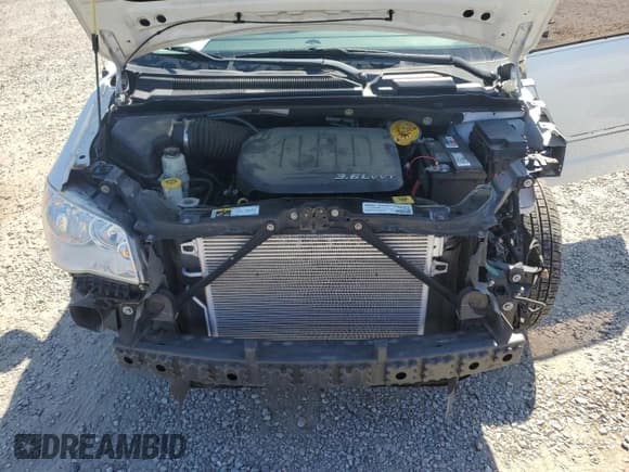 ✅ 2015 Dodge Grand Caravan American Value • VIN: 2C4RDGBG5FR607234 • Лот: 80603105. Опубликован ранее на Copart с пробегом 118 626 миль. Бесплатный доступ к архиву аукционных продаж из США и подробный отчёт об истории автомобиля на DreamBid. Изображение 12.