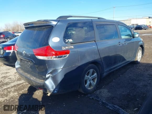 ✅ 2014 Toyota Sienna LE • VIN: 5TDKK3DCXES412410 • Lot: 43777852. Listed on IAAI with 228,333 mi. Free auction sales archive from the USA and detailed vehicle history report at DreamBid. Image 4.