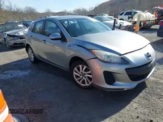✅ 2013 Mazda 3 i Touring • VIN: JM1BL1LP0D1769144 • Lot: 43675874. Listed on IAAI with 148,418 mi. Free auction sales archive from the USA and detailed vehicle history report at DreamBid. Image 1.