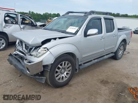 ✅ 2011 Nissan Frontier Pro-4X • VIN: 1N6AD0EV6BC427890 • Lot: 42316203. Listed on IAAI with 259,337 mi. Free auction sales archive from the USA and detailed vehicle history report at DreamBid. Image 2.