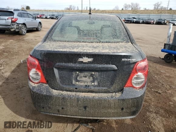 ✅ 2014 Chevrolet Sonic LS • VIN: 1G1JA5SH5E4144086 • Lot: 49738805. Listed on Copart with 127,792 mi. Free auction sales archive from the USA and detailed vehicle history report at DreamBid. Image 6.