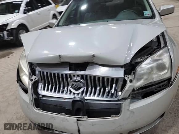 ✅ 2008 Mercury Milan • VIN: 3MEHM07108R602560 • Lot: 94325405. Listed on Copart with 77,116 mi. Free auction sales archive from the USA and detailed vehicle history report at DreamBid. Image 13.