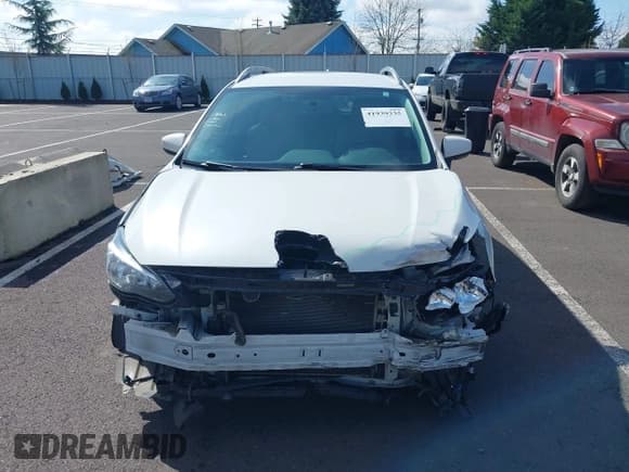 ✅ 2020 Subaru Impreza Premium • VIN: 4S3GTAV62L3704812 • Lot: 41939335. Listed on IAAI with 71,701 mi. Free auction sales archive from the USA and detailed vehicle history report at DreamBid. Image 13.