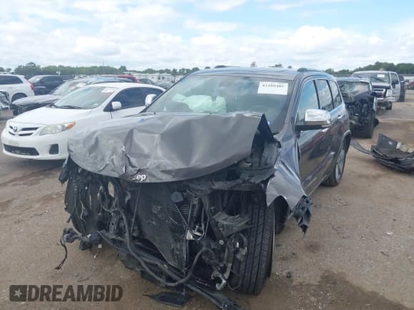 ✅ 2014 Jeep Grand Cherokee Overland • VIN: 1C4RJFCG6EC211600 • Lot: 43289489. Listed on IAAI with 133,935 mi. Free auction sales archive from the USA and detailed vehicle history report at DreamBid. Image 18.