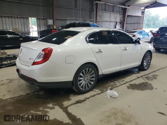 ✅ 2013 Lincoln MKS • VIN: 1LNHL9DK4DG613144 • Lot: 54354625. Listed on Copart with 104,211 mi. Free auction sales archive from the USA and detailed vehicle history report at DreamBid. Image 3.