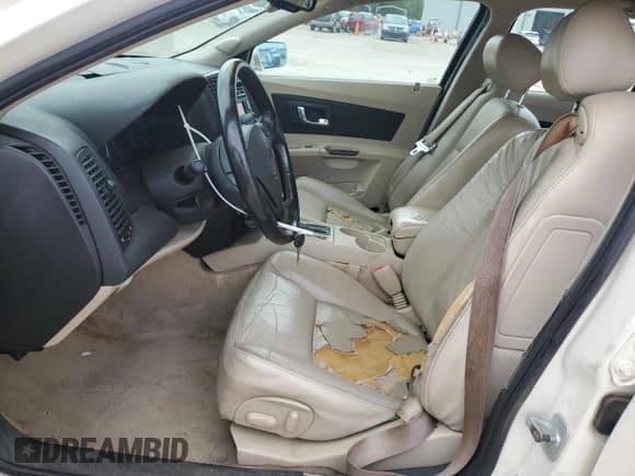 ✅ 2004 Cadillac CTS • VIN: 1G6DM577X40164953 • Lot: 70134254. Listed on Copart with 229,874 mi. Free auction sales archive from the USA and detailed vehicle history report at DreamBid. Image 7.