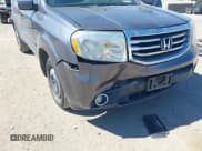 ✅ 2014 Honda Pilot EX-L • VIN: 5FNYF3H72EB015354 • Lot: 43403546. Listed on IAAI with 132,249 mi. Free auction sales archive from the USA and detailed vehicle history report at DreamBid. Image 6.