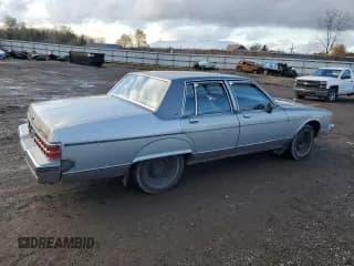 ✅ 1986 Pontiac Parisienne • VIN: 1G2BL69H3GX217317 • Лот: 79230884. Опубликован ранее на Copart с пробегом 74 132 миль. Бесплатный доступ к архиву аукционных продаж из США и подробный отчёт об истории автомобиля на DreamBid. Изображение 3.