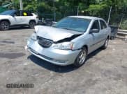 ✅ 2005 Toyota Corolla CE • VIN: JTDBR32E250055971 • Lot: 42660536. Listed on IAAI with 299,999 mi. Free auction sales archive from the USA and detailed vehicle history report at DreamBid. Image 2.