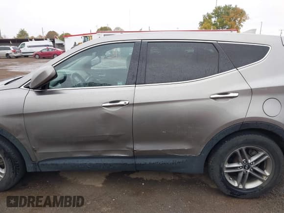 ✅ 2017 Hyundai Santa Fe 2.4L • VIN: 5NMZTDLB3HH003960 • Лот: 43535086. Опубликован ранее на IAAI с пробегом 164 538 миль. Бесплатный доступ к архиву аукционных продаж из США и подробный отчёт об истории автомобиля на DreamBid. Изображение 14.