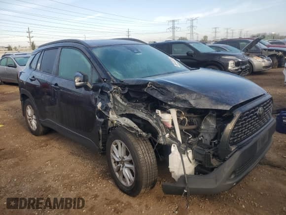 ✅ 2022 Toyota Corolla Cross LE • VIN: 7MUBAABG6NV005221 • Lot: 86443625. Listed on Copart with 74,970 mi. Free auction sales archive from the USA and detailed vehicle history report at DreamBid. Image 4.