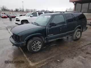 2002 Chevrolet Blazer LS z VIN 1GNDT13WX2K219285, wystawiony jako Copart lot #81238524 z przebiegiem 209 498 mil mil oraz Szkoda całkowita • Salvage title. Historia ofert i sprzedaży dostępna na DreamBid. Obrazek 1.
