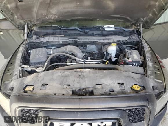 2021 Ram 1500 Warlock z VIN 1C6RR6GT2MS575041, wystawiony jako Copart lot #73572404 z przebiegiem 94 601 mil mil oraz Czysty tytuł • Clean title. Historia ofert i sprzedaży dostępna na DreamBid. Obrazek 11.