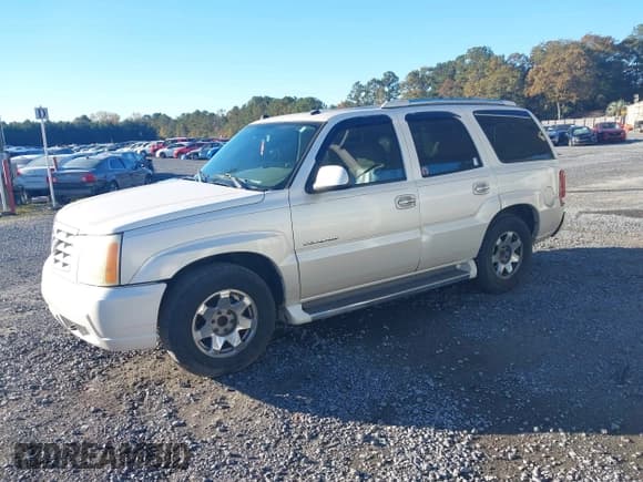 ✅ 2004 Cadillac Escalade • VIN: 1GYEC63T34R290686 • Lot: 43658224. Listed on IAAI with 186,701 mi. Free auction sales archive from the USA and detailed vehicle history report at DreamBid. Image 2.