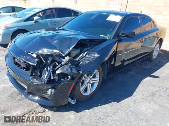 2021 Dodge Charger SXT with VIN 2C3CDXBG4MH536671, listed as a IAAI auction lot 43460985 with 83,143 mi miles and . Bid and sale history available at DreamBid. Image 2.