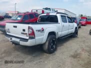 ✅ 2012 Toyota Tacoma • VIN: 3TMMU4FN9CM040840 • Lot: 42009044. Listed on IAAI with 241,714 mi. Free auction sales archive from the USA and detailed vehicle history report at DreamBid. Image 4.