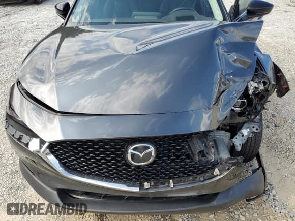 ✅ 2023 Mazda CX-30 Premium • VIN: 3MVDMBDY7PM572335 • Lot: 66309425. Wystawiony na Copart z przebiegiem 87 436 mil. Bezpłatny archiwum sprzedaży aukcyjnych z USA i szczegółowy raport historii pojazdu na DreamBid. Zdjęcie 12.