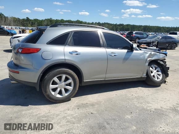✅ 2004 Infiniti FX • VIN: JNRAS08W44X211657 • Лот: 68697285. Опубликован ранее на Copart с пробегом Не указан. Бесплатный доступ к архиву аукционных продаж из США и подробный отчёт об истории автомобиля на DreamBid. Изображение 3.