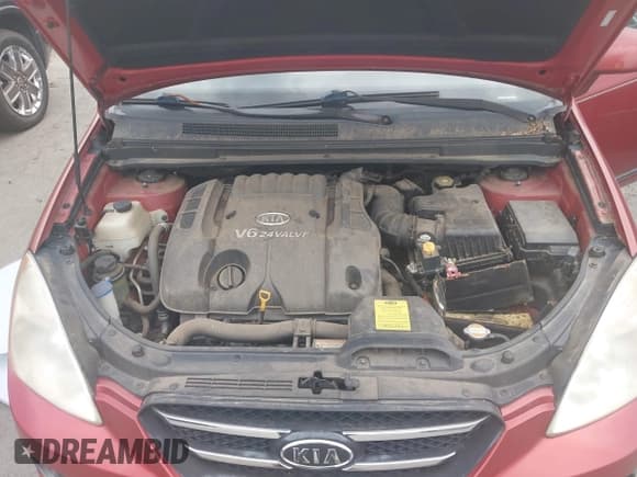 ✅ 2007 Kia Rondo EX • VIN: KNAFG526077116012 • Lot: 43106317. Wystawiony na IAAI z przebiegiem 61 104 mil. Bezpłatny archiwum sprzedaży aukcyjnych z USA i szczegółowy raport historii pojazdu na DreamBid. Zdjęcie 10.