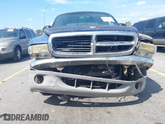 ✅ 2000 Dodge Dakota Sport • VIN: 1B7GL2AX8YS783520 • Lot: 43277615. Listed on IAAI with 303,682 mi. Free auction sales archive from the USA and detailed vehicle history report at DreamBid. Image 6.
