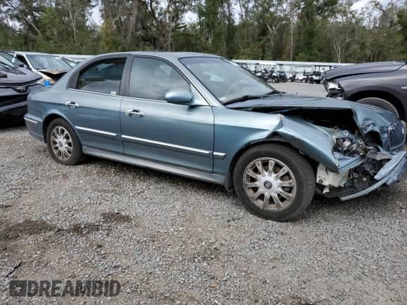 2004 Hyundai Sonata GLS z VIN KMHWF35H54A045598, wystawiony jako Copart lot #86837924 z przebiegiem Nie podano mil oraz Szkoda całkowita • Salvage title. Historia ofert i sprzedaży dostępna na DreamBid. Obrazek 4.