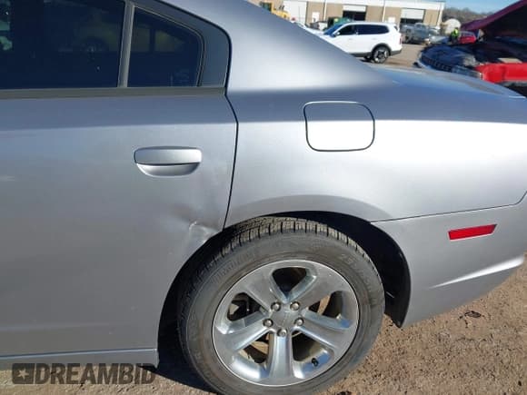 ✅ 2014 Dodge Charger SXT • VIN: 2C3CDXHG9EH312854 • Lot: 43799757. Listed on IAAI with 267,115 mi. Free auction sales archive from the USA and detailed vehicle history report at DreamBid. Image 6.