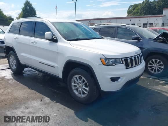 2018 Jeep Grand Cherokee Altitude z VIN 1C4RJFAGXJC504400, wystawiony jako IAAI lot #43318140 z przebiegiem 100 572 mil mil oraz . Historia ofert i sprzedaży dostępna na DreamBid. Obrazek 1.