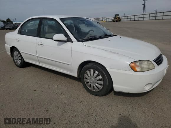 ✅ 2003 Kia Spectra • VIN: KNAFB121635229450 • Лот: 47084595. Опубликован ранее на Copart с пробегом 200 586 миль. Бесплатный доступ к архиву аукционных продаж из США и подробный отчёт об истории автомобиля на DreamBid. Изображение 4.