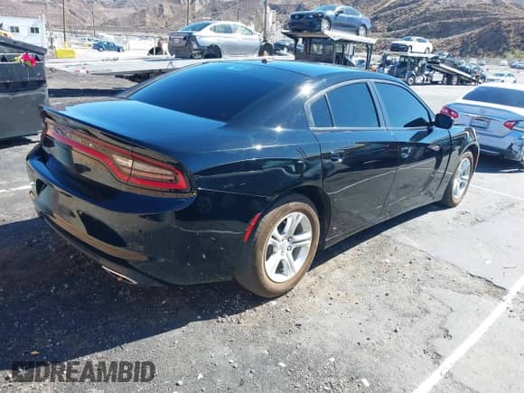 2021 Dodge Charger SXT with VIN 2C3CDXBG4MH536671, listed as a IAAI auction lot 43460985 with 83,143 mi miles and . Bid and sale history available at DreamBid. Image 4.
