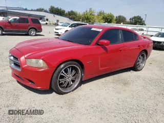 2012 Dodge Charger RT Plus with VIN 2C3CDXCT8CH178744, listed as a Copart auction lot 71129755 with 209,020 mi miles and Salvage title. Bid and sale history available at DreamBid. Image 1.