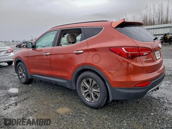 ✅ 2014 Hyundai Santa Fe • VIN: 5XYZU3LB6EG224224 • Лот: 94469115. Опубликован ранее на Copart с пробегом 143 111 миль. Бесплатный доступ к архиву аукционных продаж из США и подробный отчёт об истории автомобиля на DreamBid. Изображение 2.