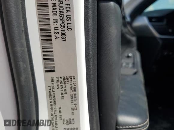 ✅ 2023 Jeep Grand Cherokee Altitude • VIN: 1C4RJGAG5PC510037 • Lot: 69645445. Listed on Copart with 59,419 mi. Free auction sales archive from the USA and detailed vehicle history report at DreamBid. Image 13.