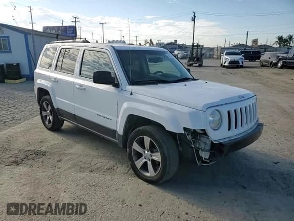 ✅ 2016 Jeep Patriot High Altitude • VIN: 1C4NJRFB2GD545359 • Lot: 82190715. Listed on Copart with 136,785 mi. Free auction sales archive from the USA and detailed vehicle history report at DreamBid. Image 15.