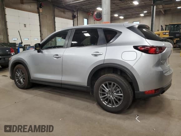 ✅ 2021 Mazda CX-5 Touring • VIN: JM3KFBCMXM0453623 • Lot: 90025385. Wystawiony na Copart z przebiegiem 83 246 mil. Bezpłatny archiwum sprzedaży aukcyjnych z USA i szczegółowy raport historii pojazdu na DreamBid. Zdjęcie 2.