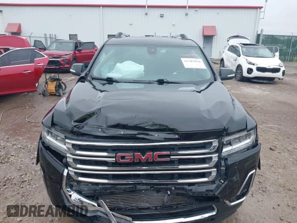 ✅ 2023 GMC Acadia SLT • VIN: 1GKKNML43PZ225605 • Lot: 43383834. Listed on IAAI with 41,566 mi. Free auction sales archive from the USA and detailed vehicle history report at DreamBid. Image 12.