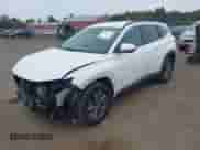 2023 Hyundai Tucson Blue z VIN KM8JBCA13PU097992, wystawiony jako IAAI lot #43153942 z przebiegiem 59 501 mil mil oraz . Historia ofert i sprzedaży dostępna na DreamBid. Obrazek 2.