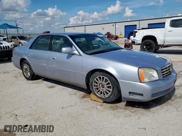 ✅ 2004 Cadillac DeVille DHS • VIN: 1G6KE54Y74U220213 • Lot: 64277385. Listed on Copart with 142,344 mi. Free auction sales archive from the USA and detailed vehicle history report at DreamBid. Image 4.