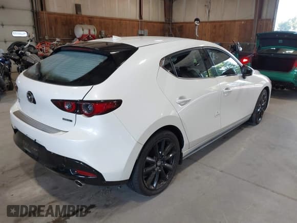 ✅ 2021 Mazda 3 Premium • VIN: JM1BPBML6M1348258 • Лот: 42752477. Опубликован ранее на IAAI с пробегом 35 285 миль. Бесплатный доступ к архиву аукционных продаж из США и подробный отчёт об истории автомобиля на DreamBid. Изображение 4.