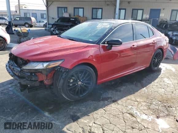 2021 Toyota Camry Hybrid XSE с VIN 4T1K31AK6MU030362, выставлен на аукционе Copart как лот 81326505 с пробегом 72 342 миль миль и Списание • Salvage title. История ставок и продаж доступна на DreamBid. Изображение 1.