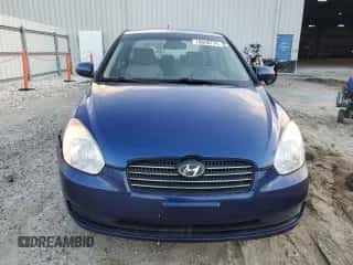 2011 Hyundai Accent GLS z VIN KMHCN4AC8BU617197, wystawiony jako Copart lot #78658214 z przebiegiem 130 327 mil mil oraz Szkoda całkowita • Salvage title. Historia ofert i sprzedaży dostępna na DreamBid. Obrazek 5.