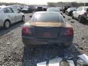 ✅ 2005 Chrysler Crossfire Limited • VIN: 1C3AN69L05X035386 • Лот: 70837984. Опубликован ранее на Copart с пробегом 36 500 миль. Бесплатный доступ к архиву аукционных продаж из США и подробный отчёт об истории автомобиля на DreamBid. Изображение 6.