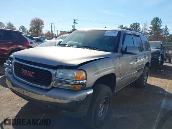 ✅ 2002 GMC Yukon SLT • VIN: 1GKEK13Z12R149729 • Lot: 43690941. Listed on IAAI with 214,772 mi. Free auction sales archive from the USA and detailed vehicle history report at DreamBid. Image 2.